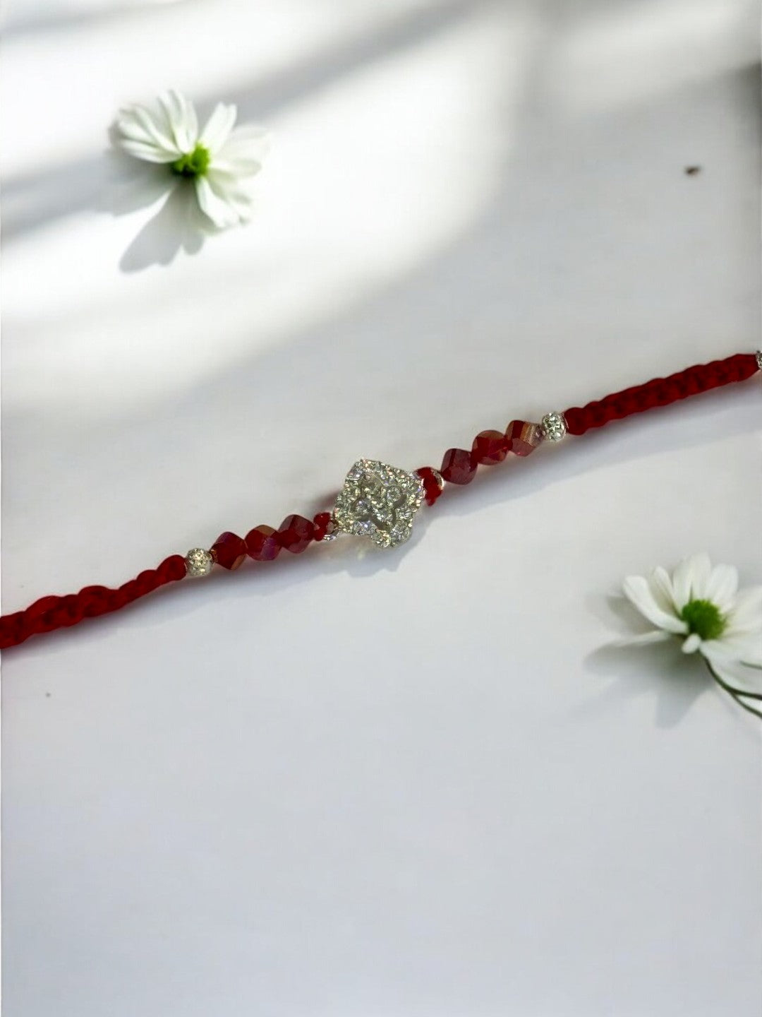 DIAMOND FLOWER TARUNIKA PURE SILVER RAKHI