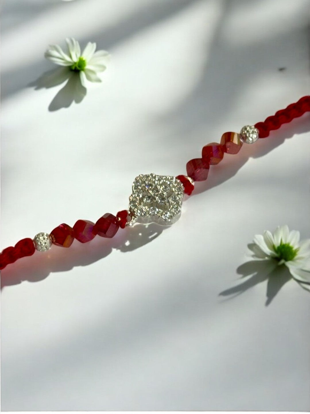 DIAMOND FLOWER TARUNIKA PURE SILVER RAKHI