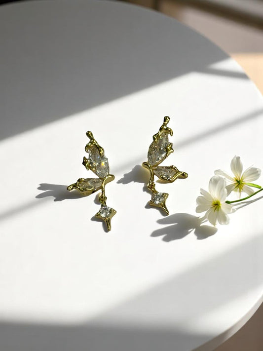 GOLDEN HANGING DIAMOND BUTTERFLY AXEL EARRINGS