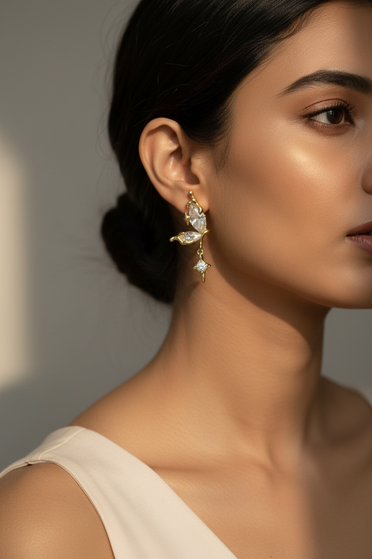 GOLDEN HANGING DIAMOND BUTTERFLY AXEL EARRINGS