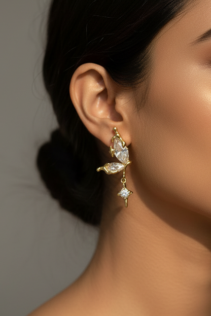 GOLDEN HANGING DIAMOND BUTTERFLY AXEL EARRINGS