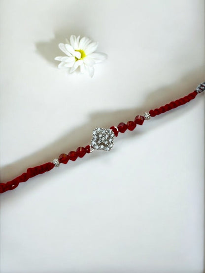 DIAMOND FLOWER TARUNIKA PURE SILVER RAKHI