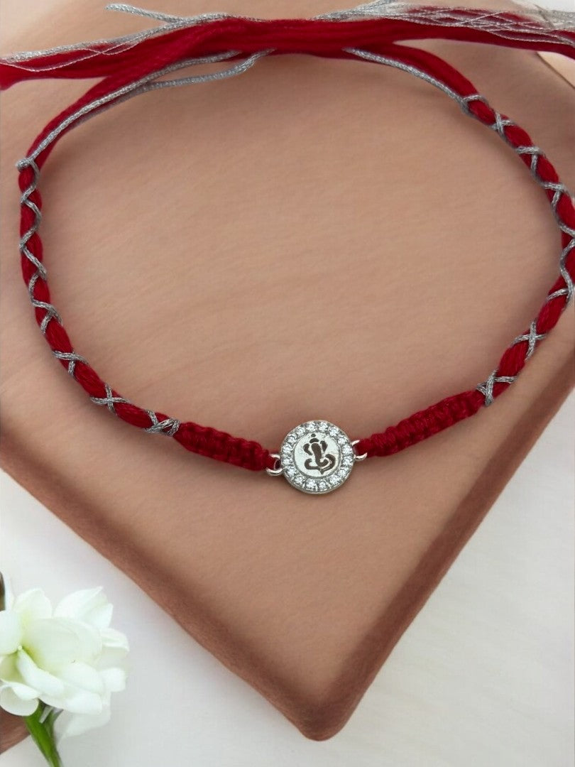 DIAMOND GANESHA TARINI PURE SILVER RAKHI