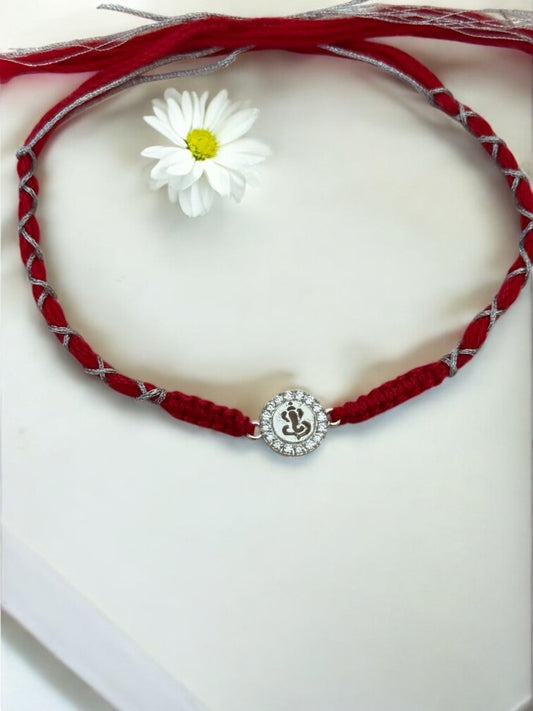DIAMOND GANESHA TARINI PURE SILVER RAKHI