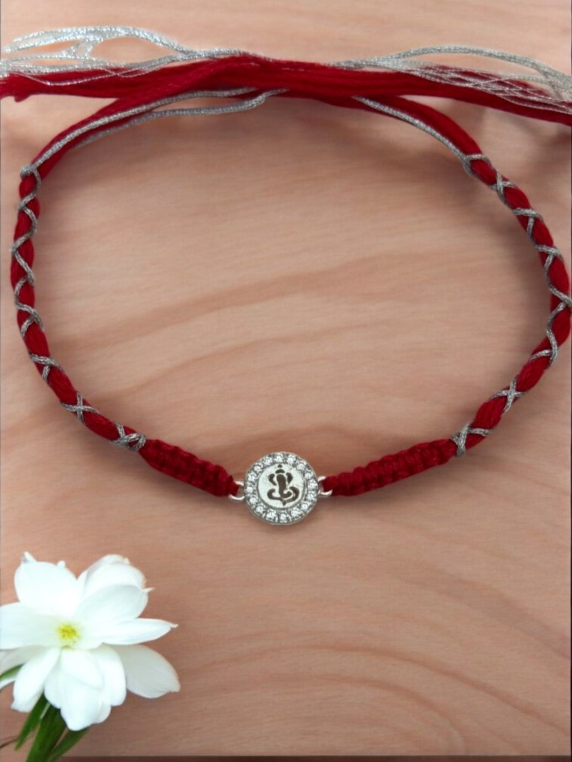 DIAMOND GANESHA TARINI PURE SILVER RAKHI
