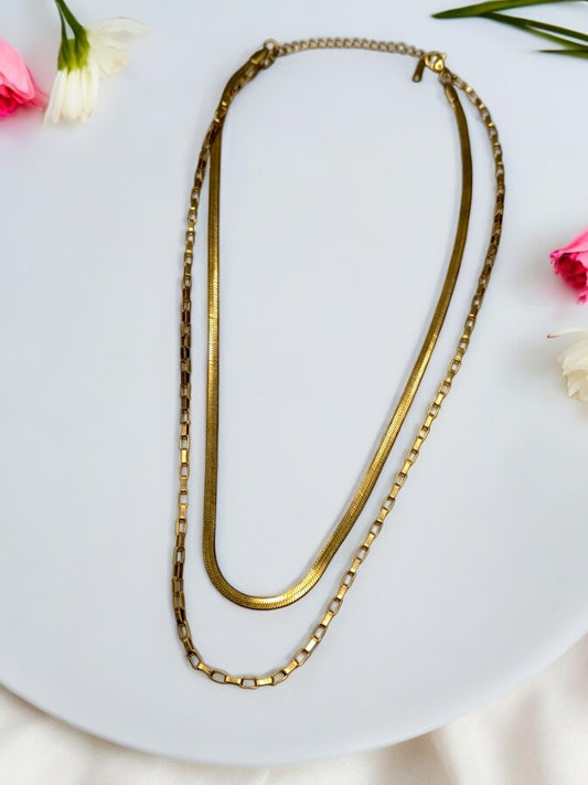 GOLDEN LAYERD CHAIN MAKE SIMPLE AND SOBER LOOK.