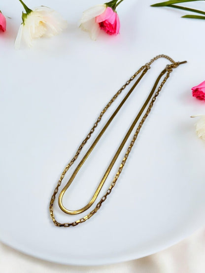 GOLDEN LAYERD CHAIN MAKE SIMPLE AND SOBER LOOK.