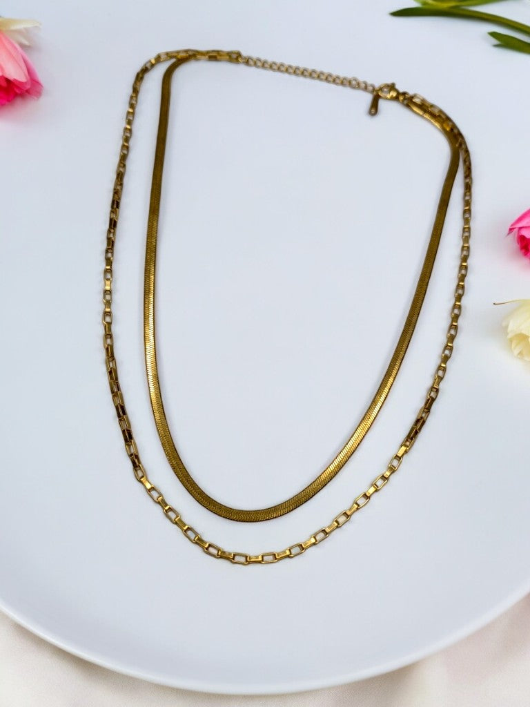 GOLDEN LAYERD CHAIN MAKE SIMPLE AND SOBER LOOK.