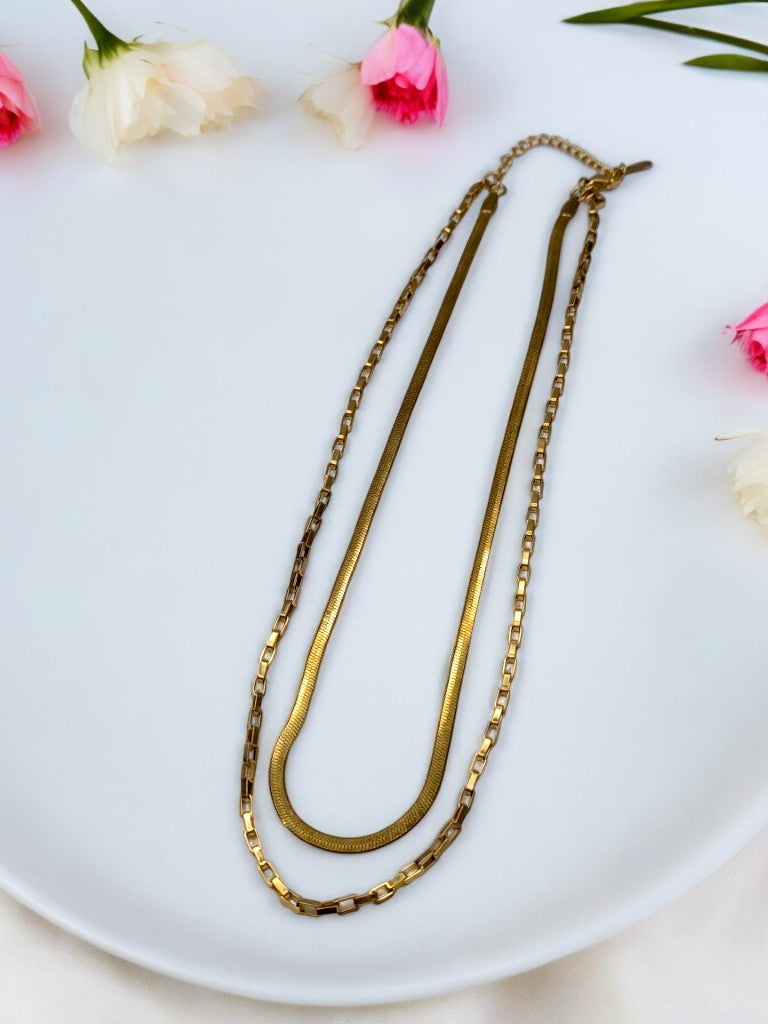 GOLDEN LAYERD CHAIN MAKE SIMPLE AND SOBER LOOK.