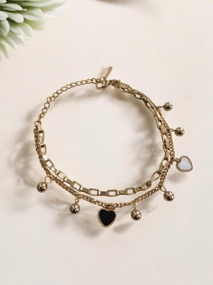 GOLDEN CHAIN WITH BLACK AND WHITE HEART AND PEARLS