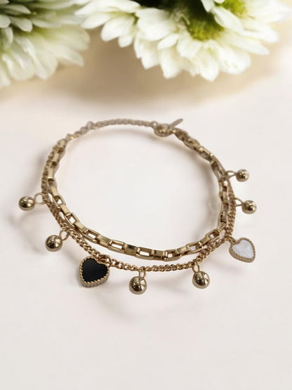 GOLDEN CHAIN WITH BLACK AND WHITE HEART AND PEARLS