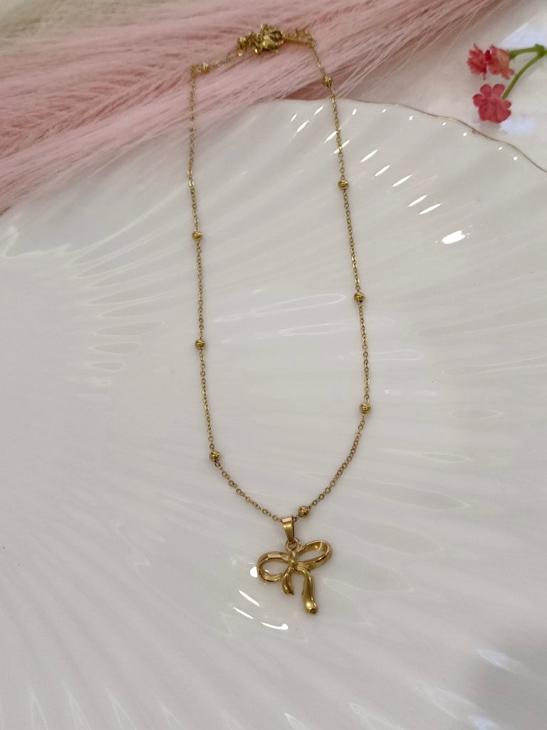 GOLDEN CHAIN WITH MINI BALLS AND BOW