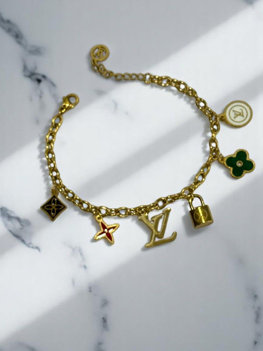 GOLDEN CHAIN WITH BRANDED MULTI CHARM BRACELET