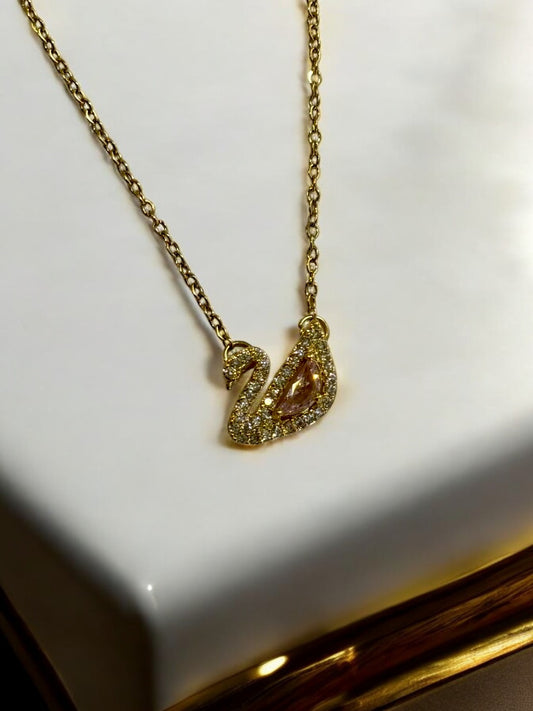 GOLDEN CHAIN WITH PINK DIAMOND SWAN