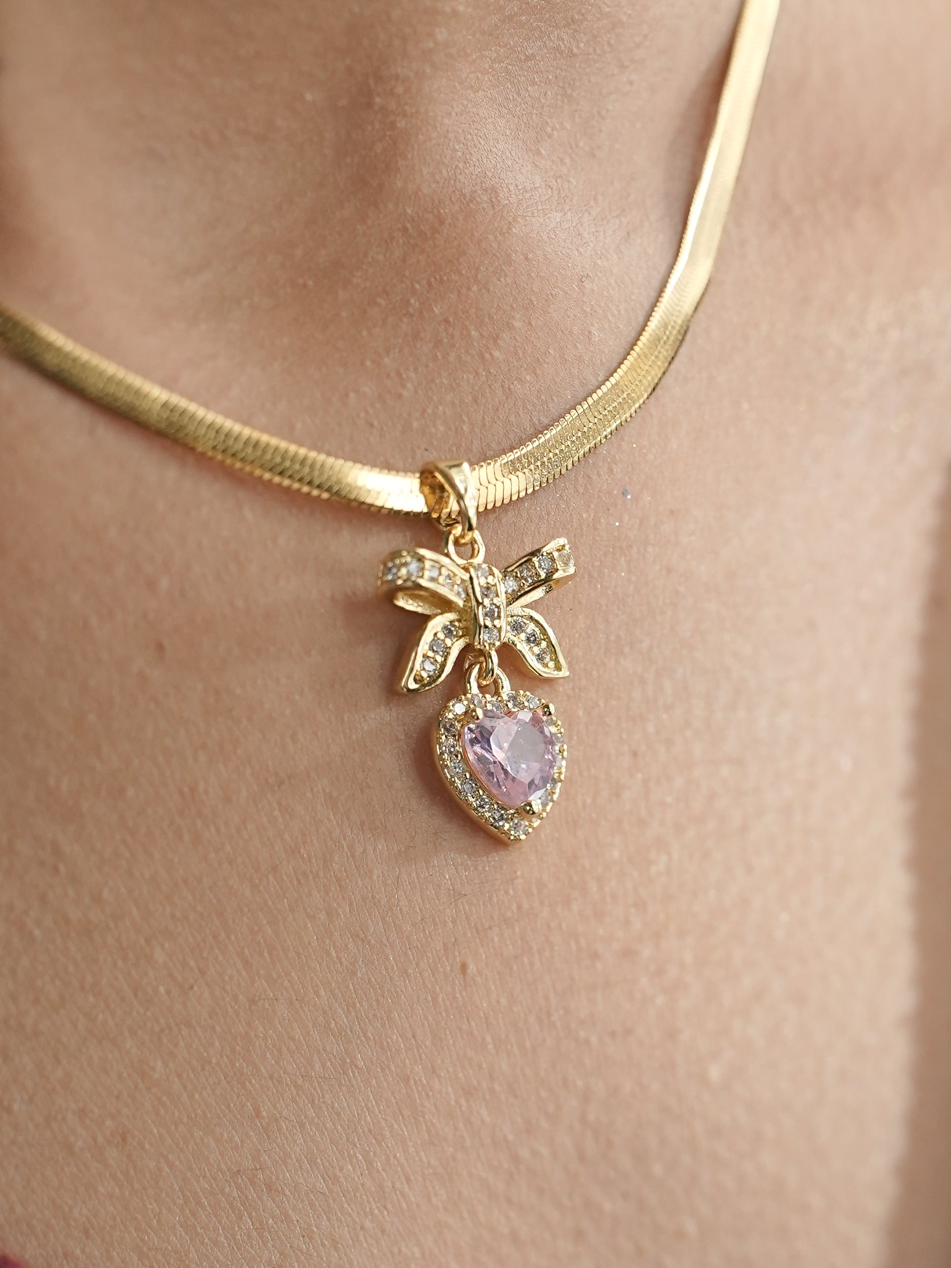 GOLDEN CHAIN WITH PINK DIAMOND AND TINY DIAMOND BOW