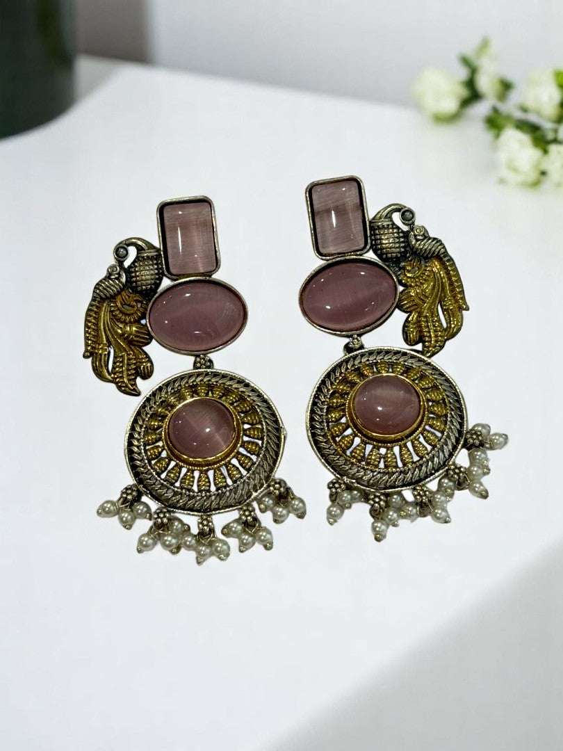 GERMAN SILVER DUAL TONE PINK STONE PEACOCK DANGLE EARRINGS