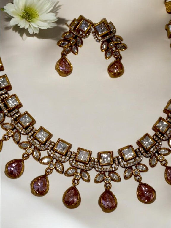 DIAMOND AND KUNDAN NECKLACE WITH PINK HANGING STONE AND EARRING