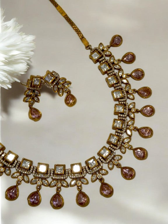 DIAMOND AND KUNDAN NECKLACE WITH PINK HANGING STONE AND EARRING
