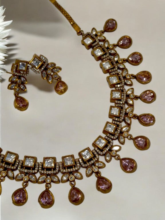 DIAMOND AND KUNDAN NECKLACE WITH PINK HANGING STONE AND EARRING
