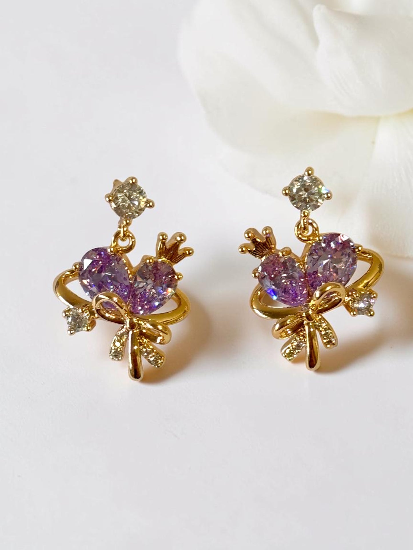 PURPLE STONE BOW AARA EARRINGS