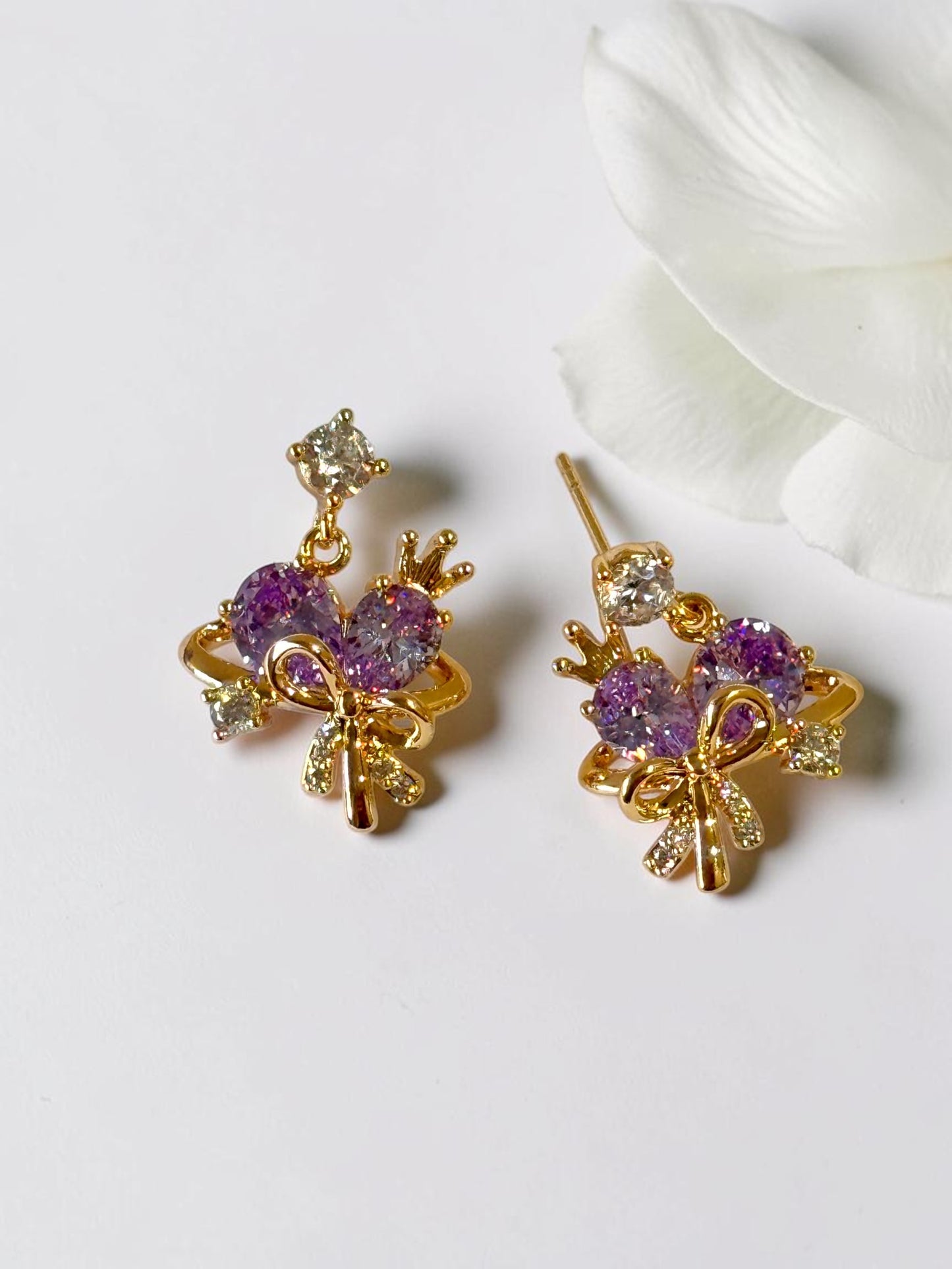 PURPLE STONE BOW AARA EARRINGS