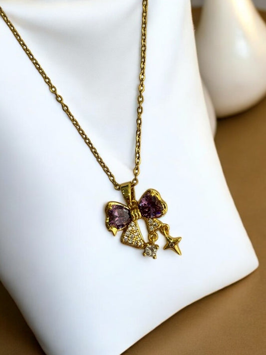 GOLDEN CHAIN WITH PURPLE DIAMOND BOW AND STAR
