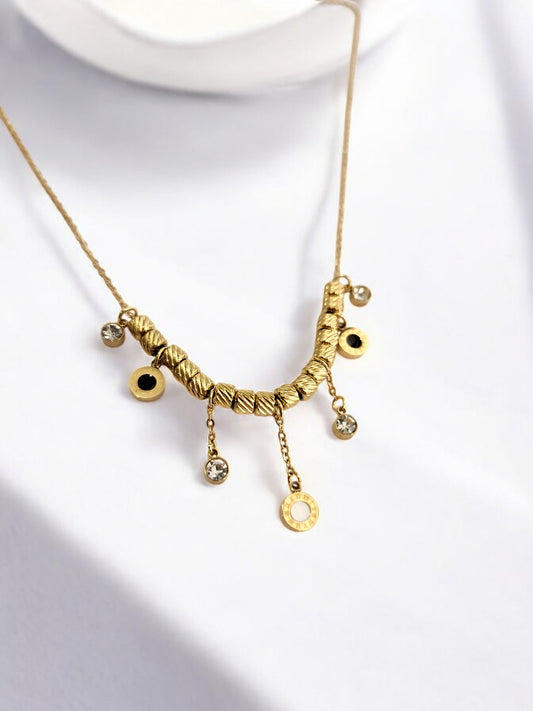 GOLDEN CHAIN WITH HANGINIG DIAMOND AND ROMAN NUMERAL CHARM