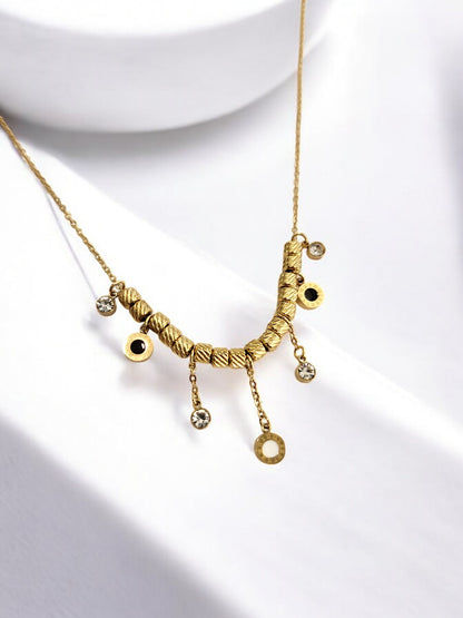 GOLDEN CHAIN WITH HANGINIG DIAMOND AND ROMAN NUMERAL CHARM