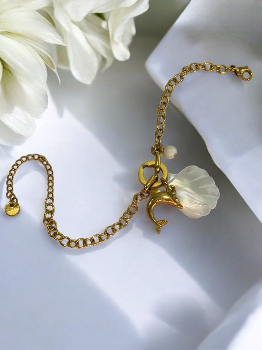 GOLDEN CHAIN WITH OCEAN CHARMS LIKE DOLPHIN, WHITE SEA SHELL AND PEARL