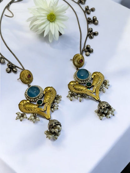 GERMAN SILVER DUAL TONE PEACOCK MOTIF AND JINGELS CHAIN EARRING