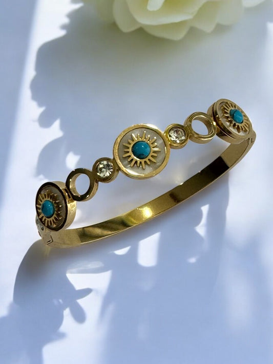 GOLDEN BRACELET WITH SEA BLUE STONE