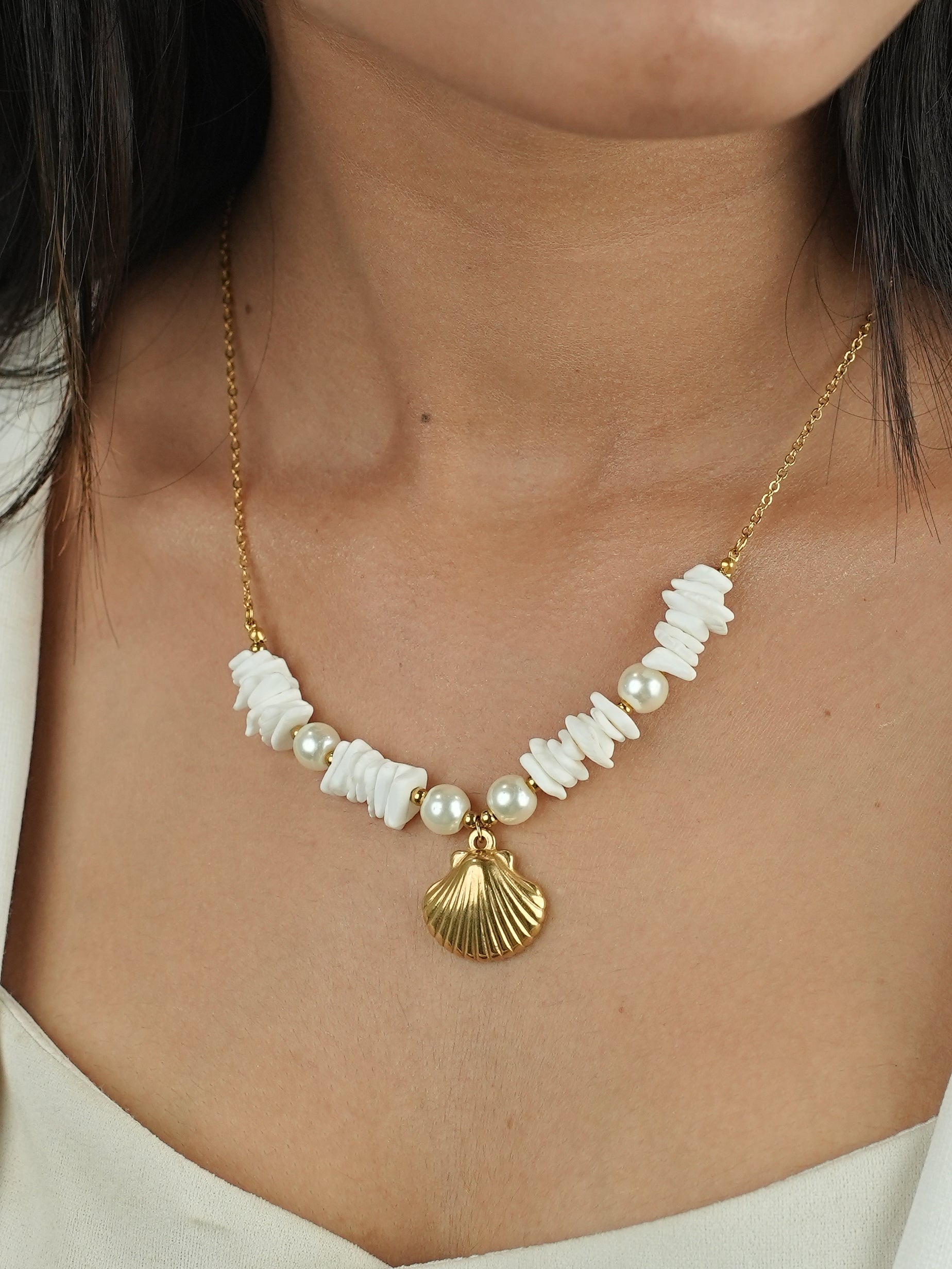 GOLDEN CHAIN WITH BEAUTIFUL PEARLS AND SHE SHELL