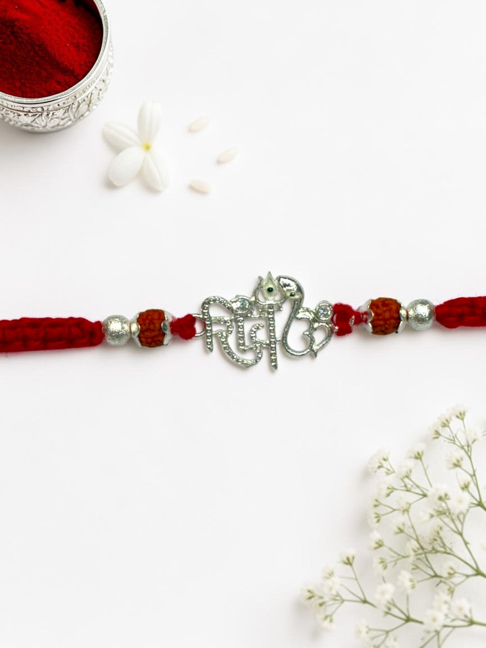 DIAMOND SHIV CHARMS FALGUNI SILVER RAKHI