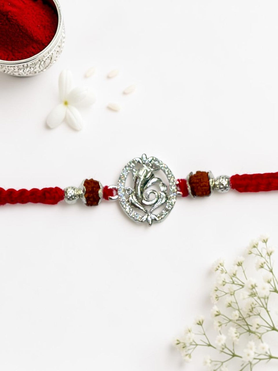 GANESH DIAMOND MUKTI SILVER RAKHI