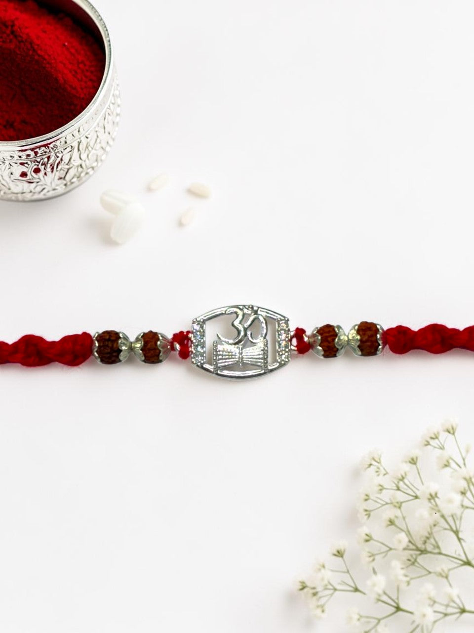 OM DAMRU DIAMOND AMORA SILVER RAKHI