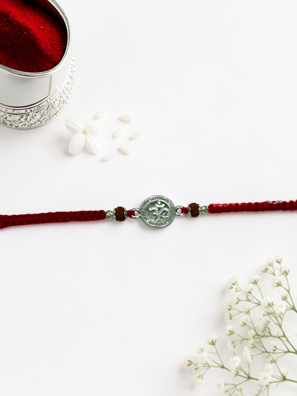 OM DIAMOND ROSEMARY SILVER RAKHI
