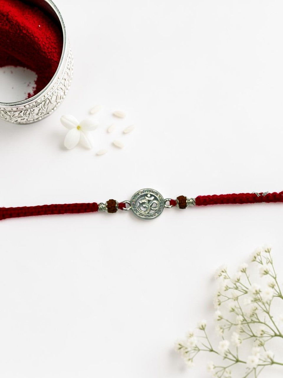 OM DIAMOND ROSEMARY SILVER RAKHI