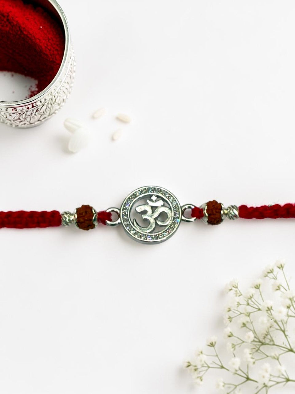 OM DIAMOND ROSEMARY SILVER RAKHI