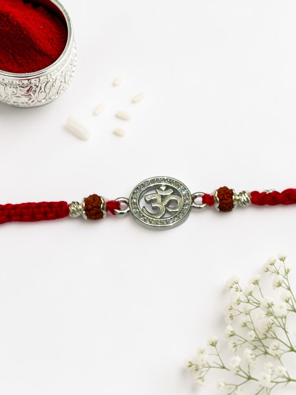 OM DIAMOND ROSEMARY SILVER RAKHI