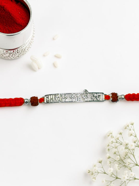 ORANGE THREAD AARADHNA SILVER RAKHI