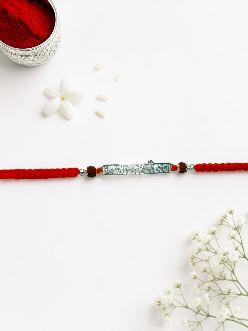 ORANGE THREAD AARADHNA SILVER RAKHI