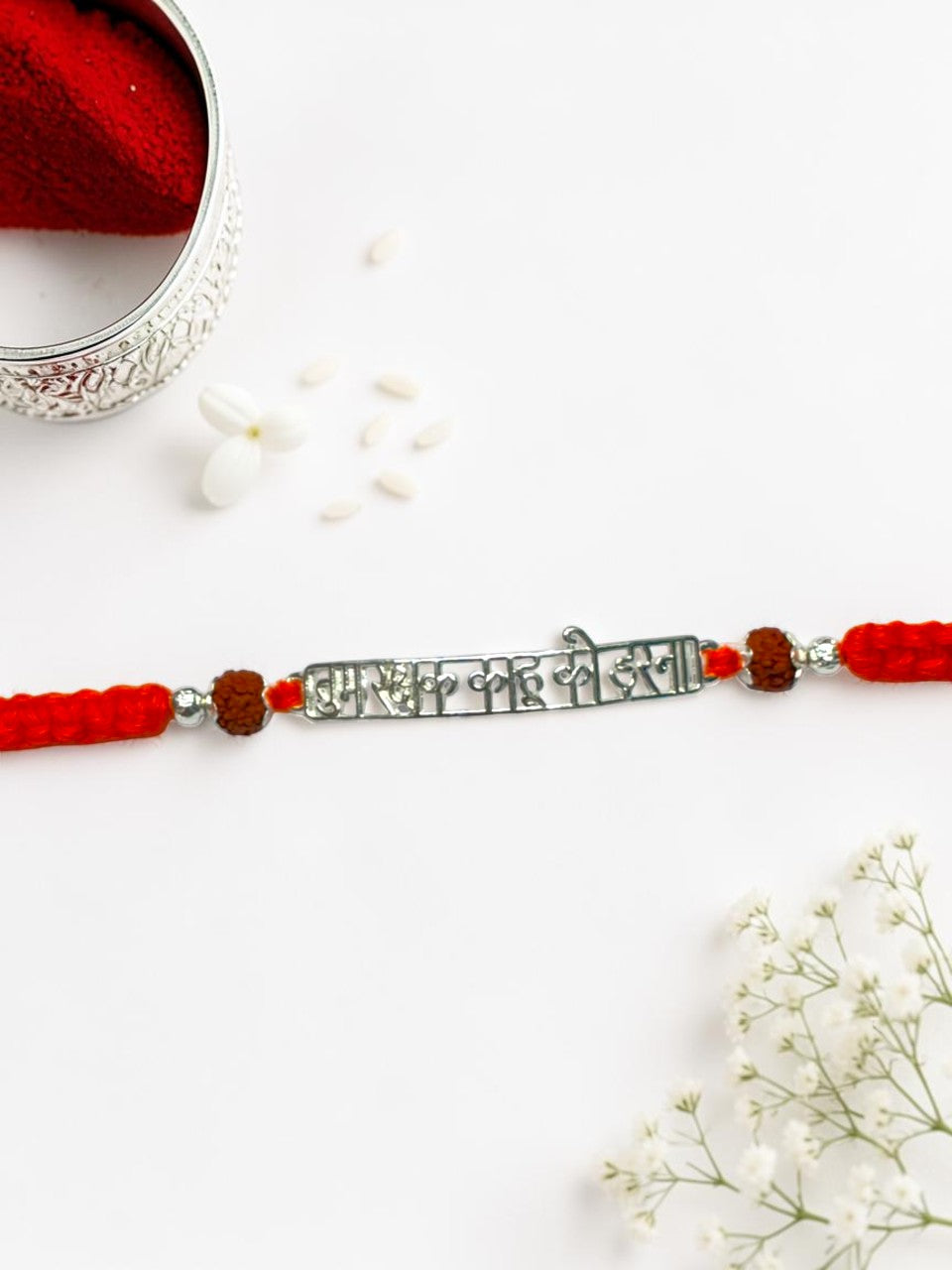 ORANGE THREAD AARADHNA SILVER RAKHI