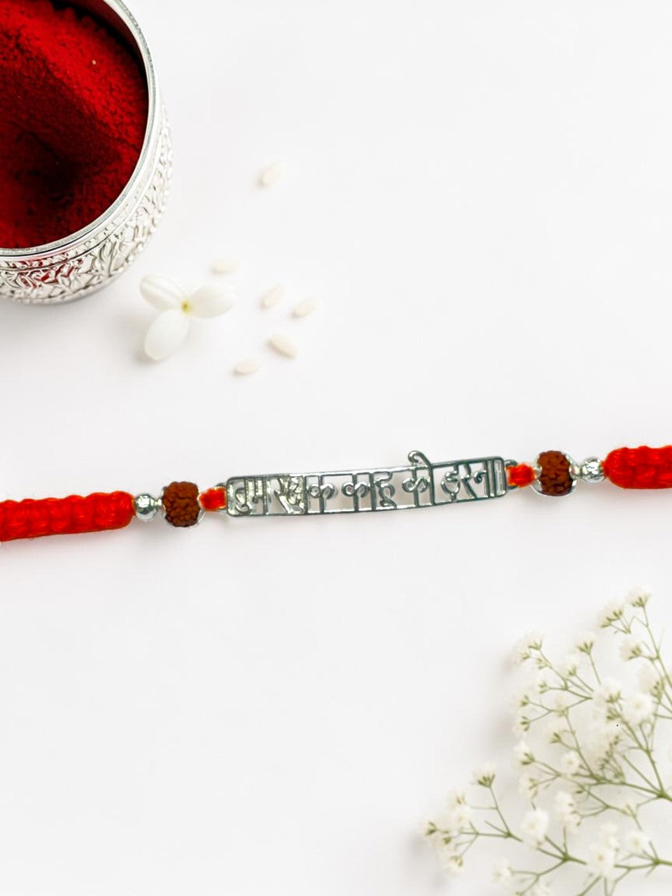 ORANGE THREAD AARADHNA SILVER RAKHI