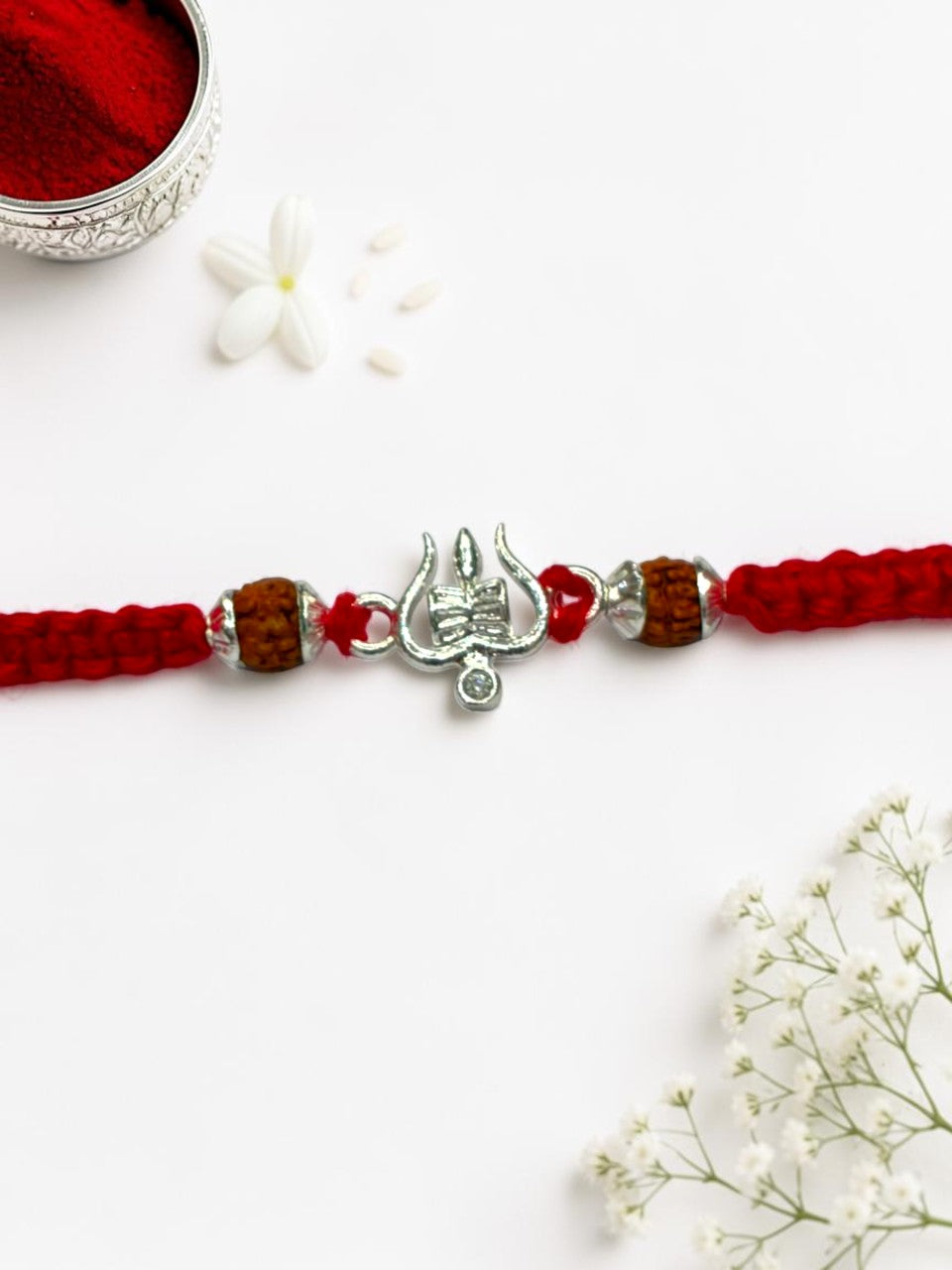 DAMRU TRISHUL DHRUVI SILVER RAKHI