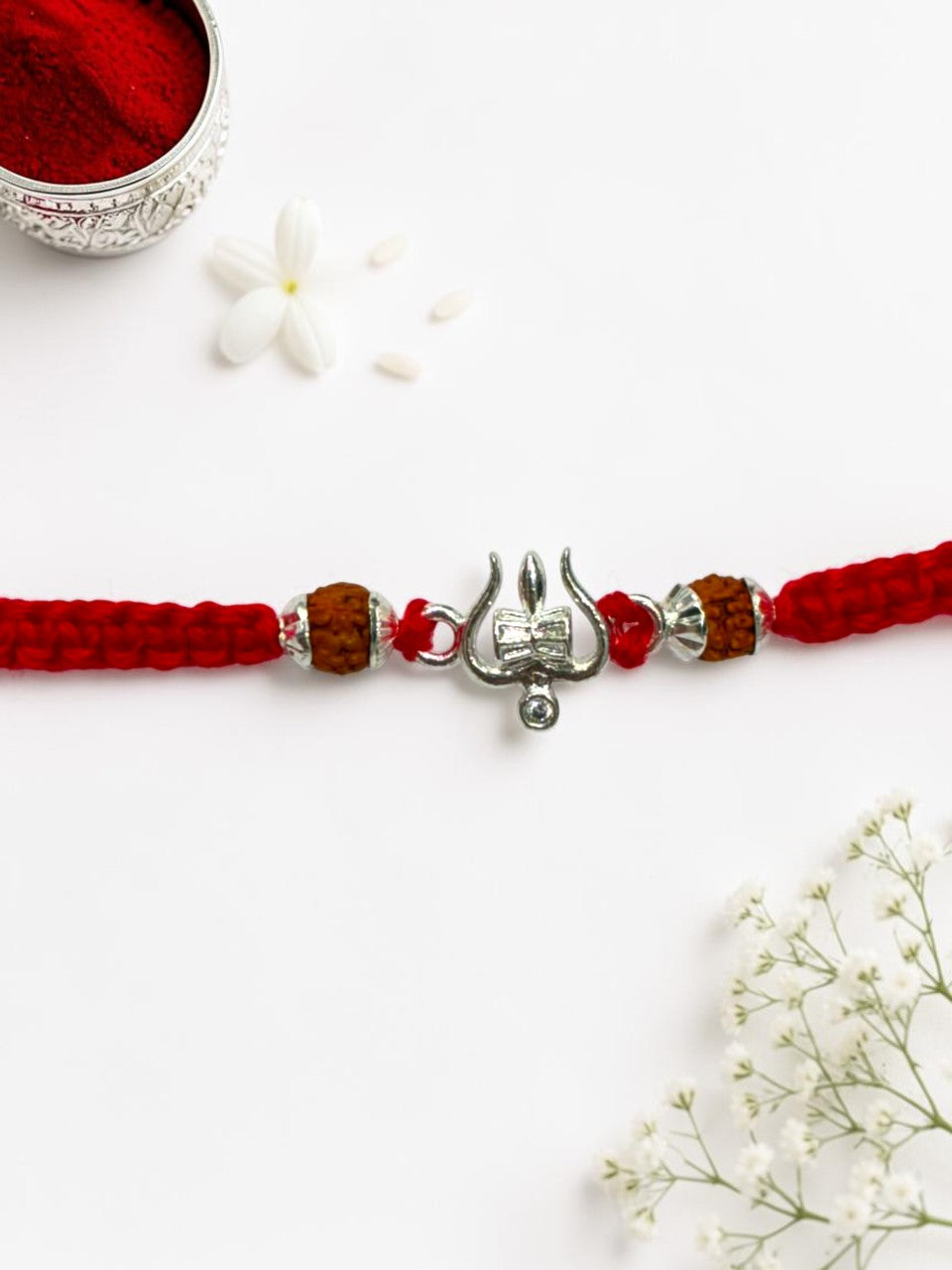 DAMRU TRISHUL DHRUVI SILVER RAKHI