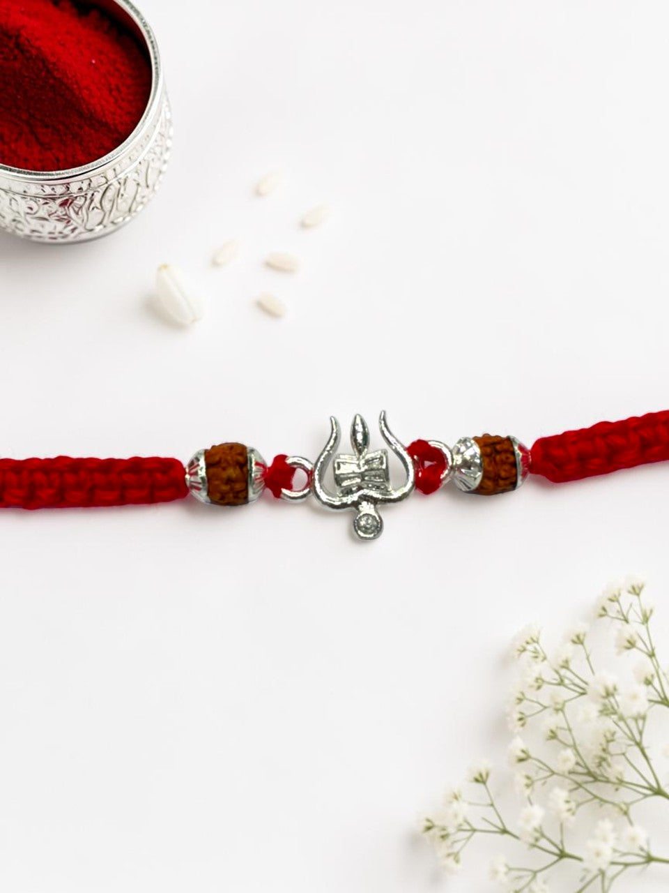 DAMRU TRISHUL DHRUVI SILVER RAKHI