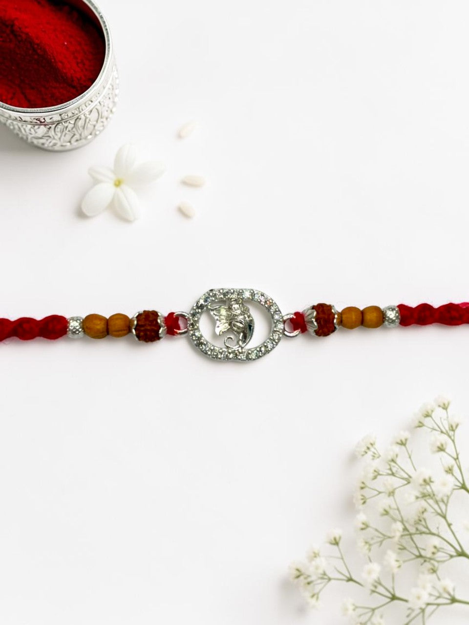 GANESH CHARLI SILVER RAKHI