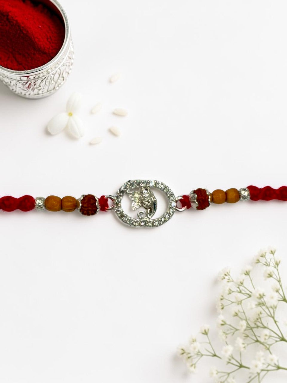 GANESH CHARLI SILVER RAKHI
