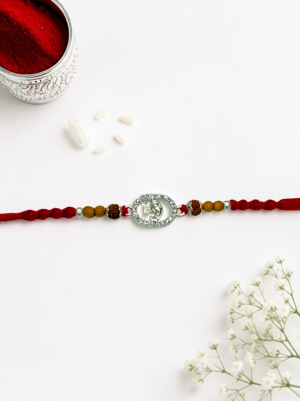 GANESH CHARLI SILVER RAKHI