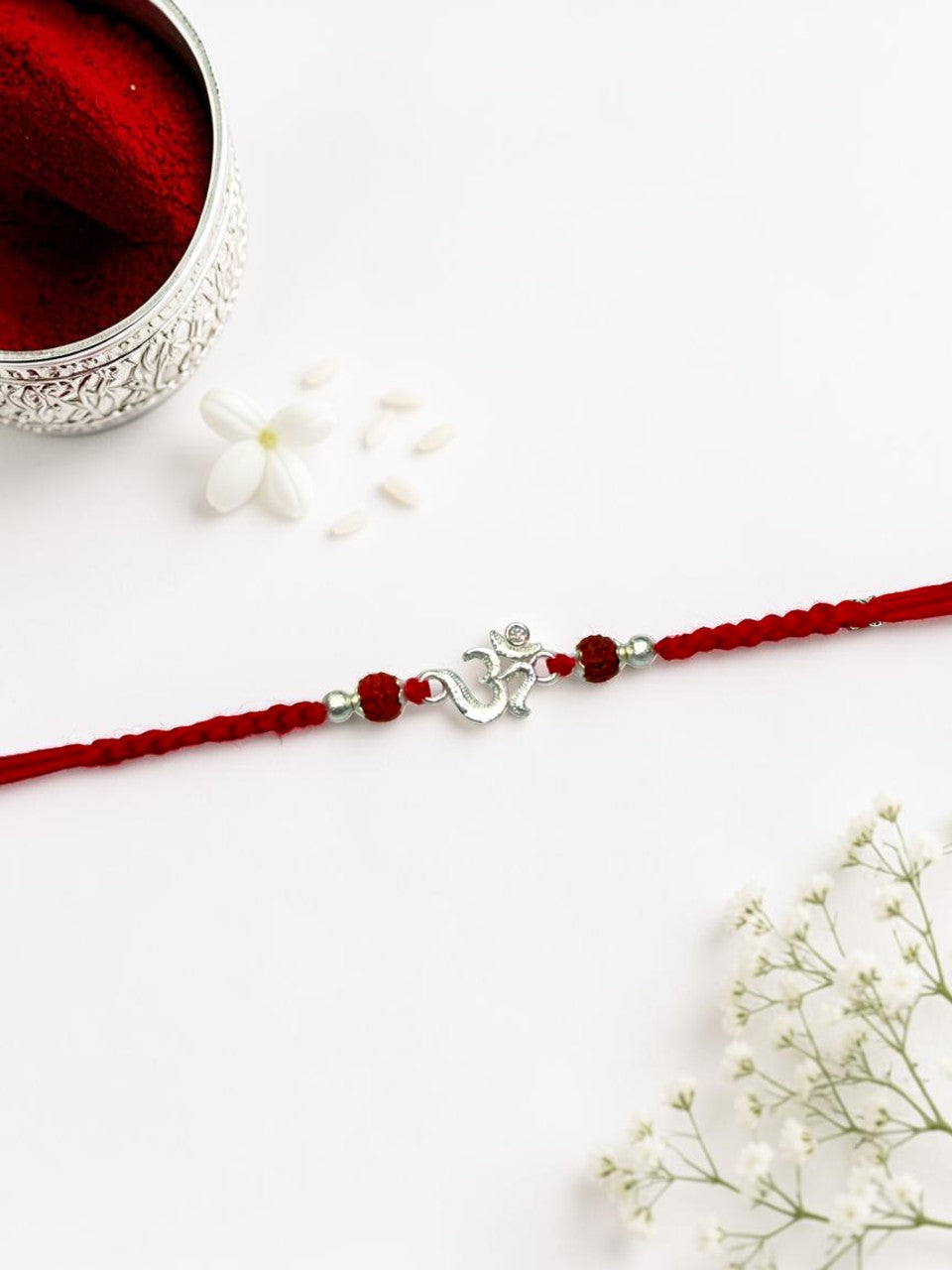 OM BHAVYA SILVER RAKHI